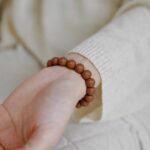 Lshana Vermilion Dawn Mother’s Day incense beads bracelet, Dunhuang Mogao Grottoes inspired, mom wearing warm natural herbal aromatherapy bracelet, gratitude gift for mother